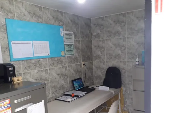 Clínica de reabilitação em Ipatinga - MG Escritório com mesa e computador