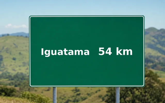 Placa de estrada indicando Iguatama a 54 km