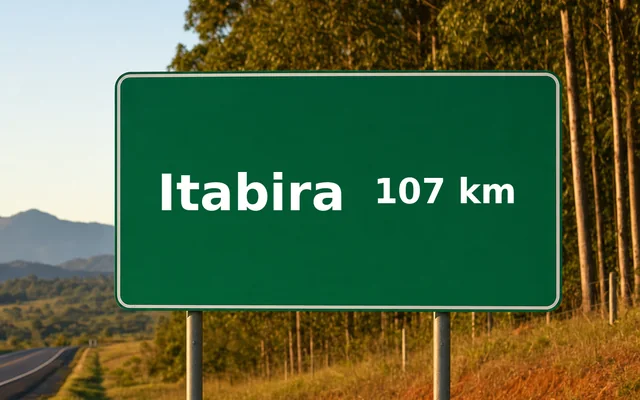 Placa de estrada indicando Itabira a 107 km